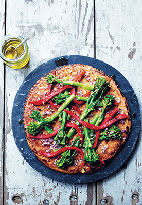 A photo of farinata with tenderstem broccoli