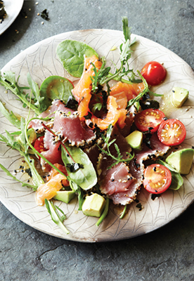 A photo of seaweed and sashimi salad